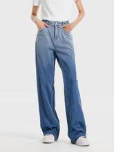 a woman in jeans